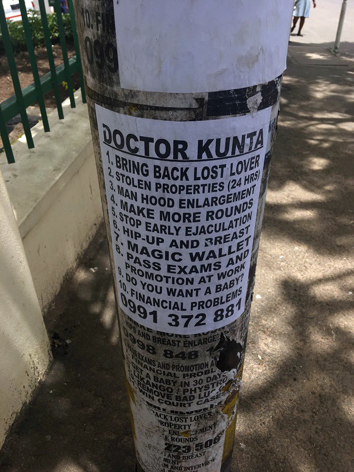 Poster advertising the services of Dr Kunta, a witch-doctor offering 'medical' and financial help.