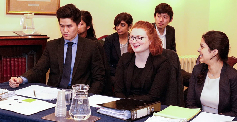 (L-R) Gilbert Lim (Christ Church), Niamh Kelly (Merton), and Shalaka Phadnis (St Peters) mooting in the national Jessup rounds