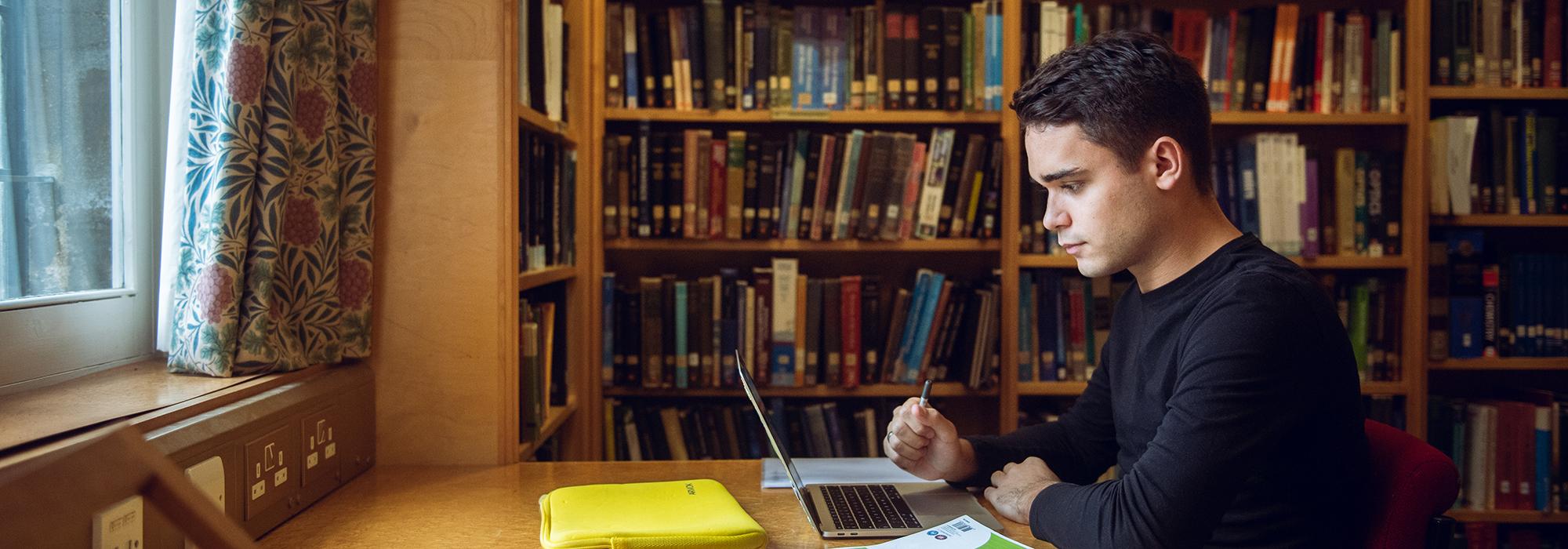 A student working in OWL library, 2019 - Photo: © John Cairns - www.johncairns.co.uk