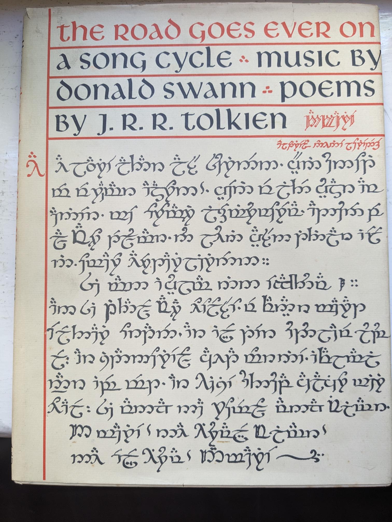 JRR Tolkien’s poems were set to music by Donald Swann, of Flanders and Swann fame, in a collection named, ‘The road goes ever on’, in which the songs are written in English and in Elvish. The front cover shows the text of Song No: 5: Namárië, written in Tengwar script.  