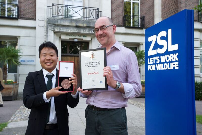 Shan was joined by their PhD supervisor, Professor Peter Holland, outside ZSL - Photo: © ZSL