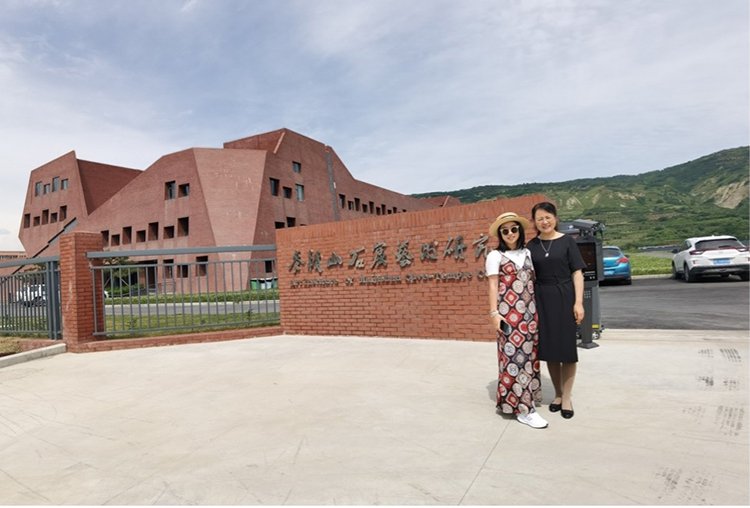 Ms Zhang and Rachel Lo in front of the Art Institute of Maijishan