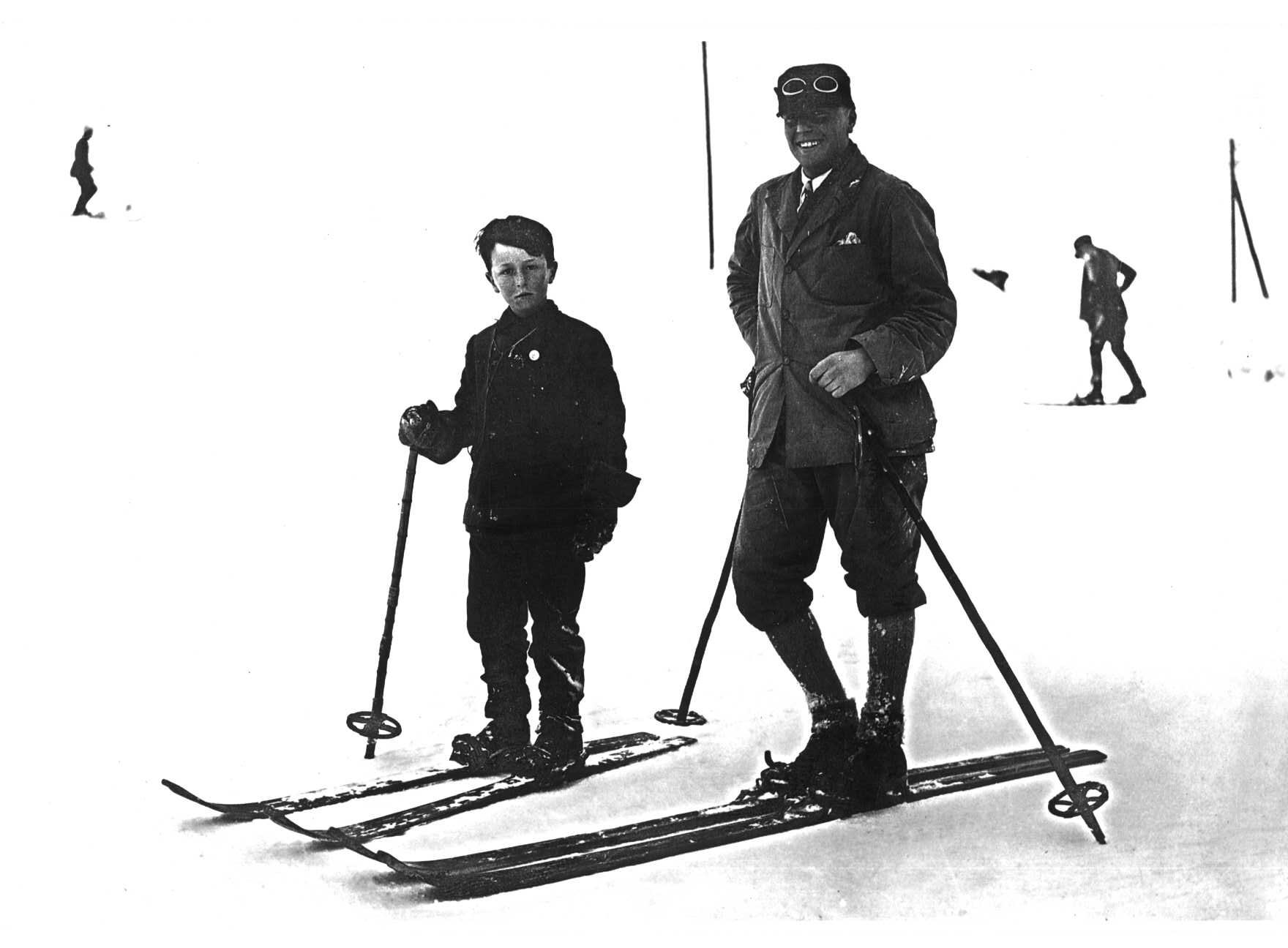 A man & boy skiing