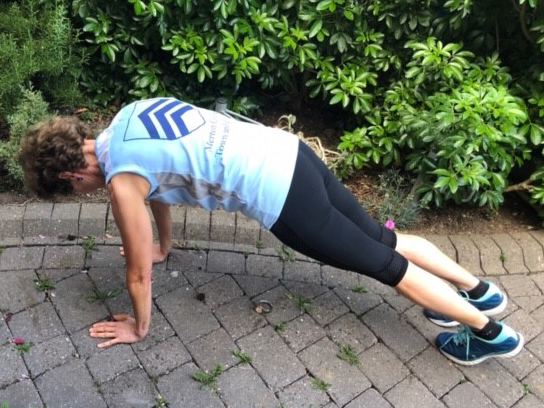 Emeritus Fellow Christine Taylor doing a plank