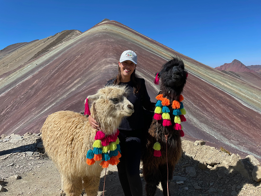 Mariana Gee Olmedilla with llamas