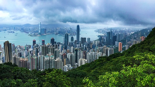 A panorama overlooking the Central and Kowloon districts of Hong Kong, taken from Victoria Peak - Photo: © Henry Grub