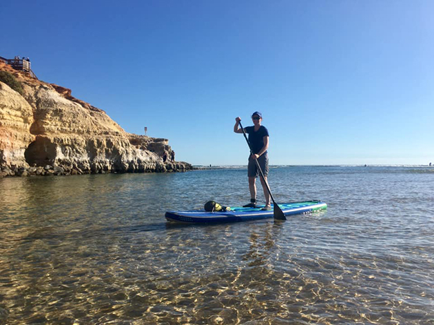 Rachel paddle-boarding