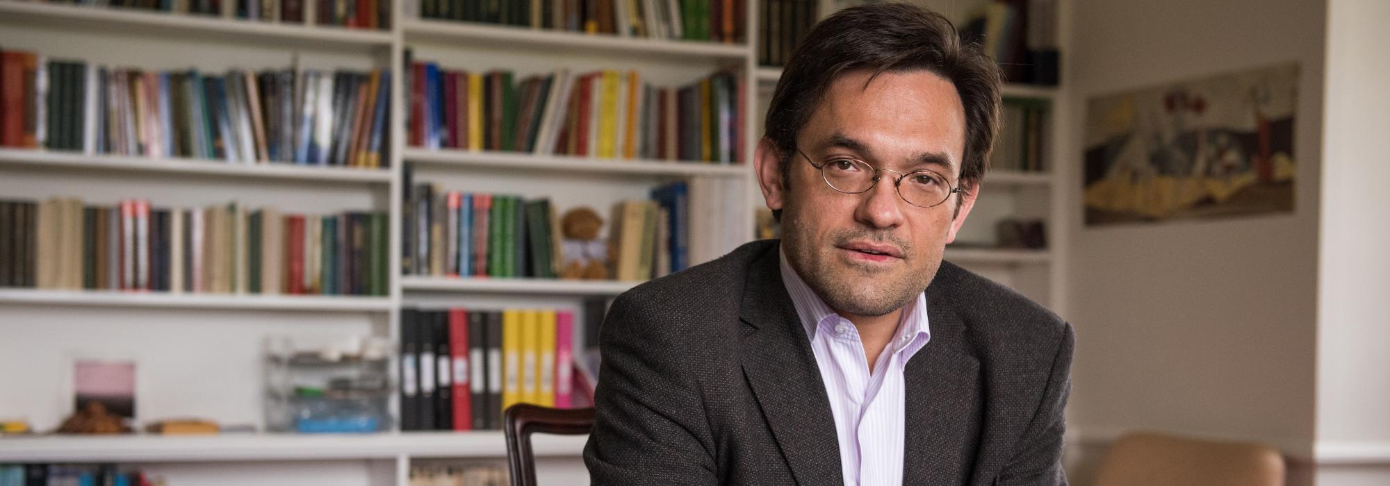 Photo of Professor Alex Schekochihin in his office, by John Cairns.