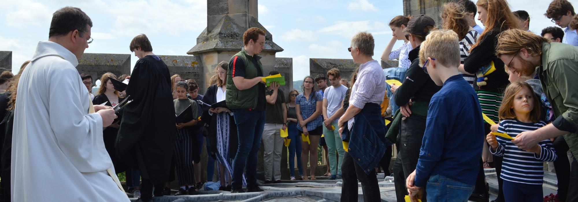 Image of Chapel Community standing at the top of the tower