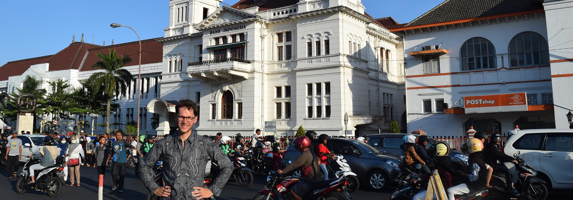 Yuri in front of the old Dutch Javaasche bank building in Yogyakarta - Photo: © Yuri van Nieuwkerk