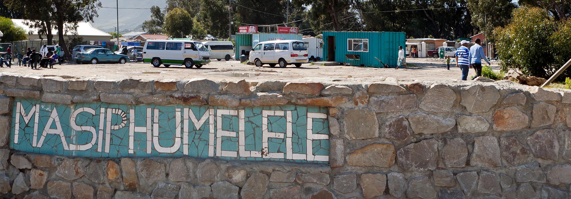 Road sign in Masiphumelele township, Cape Town - Photo: © Alcuin Lai [CC BY-NC-SA]