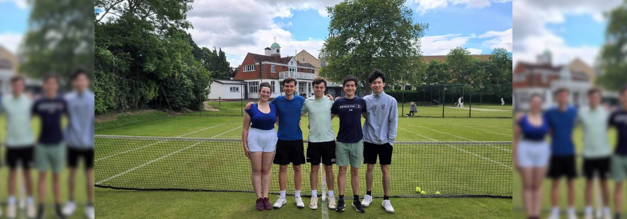 Merton Tennis Players 2023/24 one young woman and four young men on a lawn tennis court, standing for a photo at the net