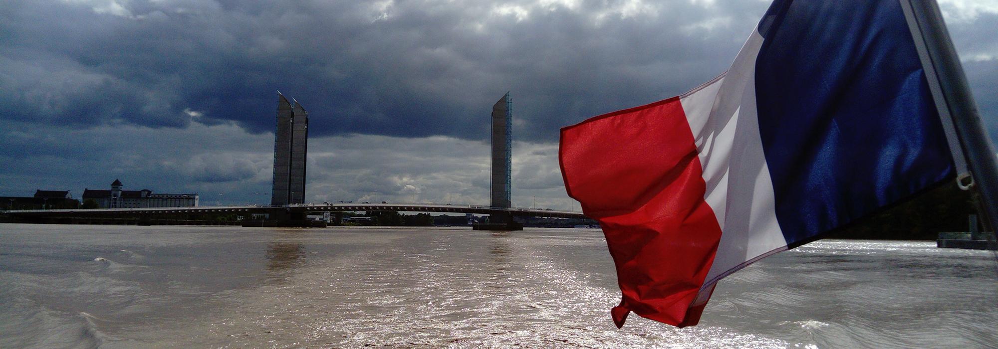 The French Tricolour and the Garonne - Photo: © Jessica Searle The French Tricolour and the Garonne - Photo: © Jessica Searle