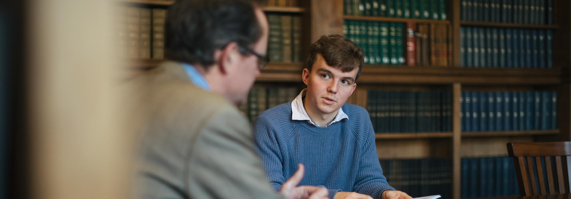 A Fellow and a student in a tutorial - Photo © Ian Wallman