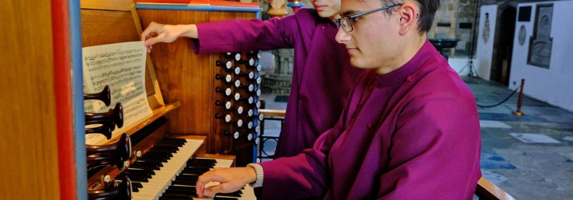 Organ Scholar plays the organ