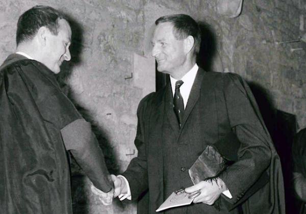 Rex Richards (right) in 1969, being welcomed to the college by John Roberts (then a Fellow in History)