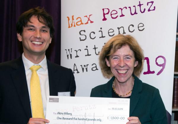Akira Wiberg receiving the Max Perutz Science Writing Award prize (a cheque for £1,500) from Medical Research Council Executive Chair Professor Fiona Watt - Photo: © Jon Barlow for the Medical Research Council