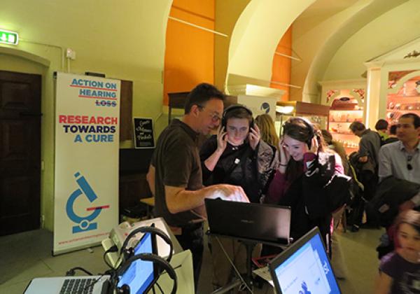 Professor King demonstrating how our ears and brains process speech sounds