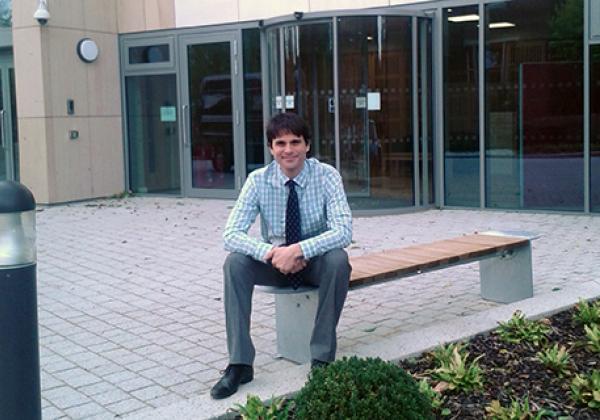 Dr Micah Muscolino outside the Dickson Poon University of Oxford China Centre Building