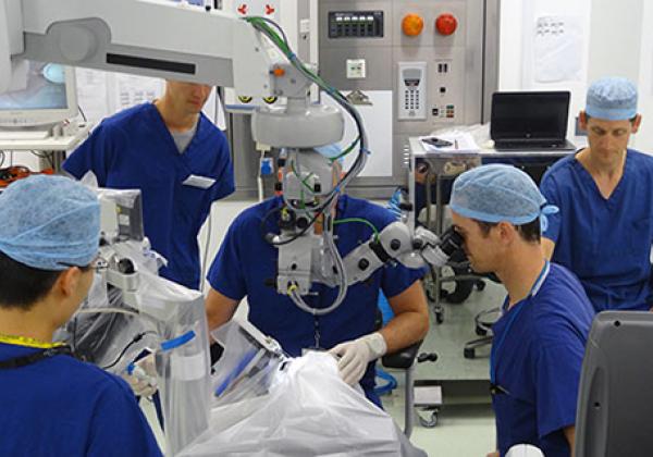 Members of the team setting up the robot