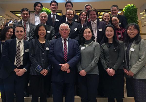 The Warden, Sir Martin Taylor, with dinner guests at La Colline, Tokyo