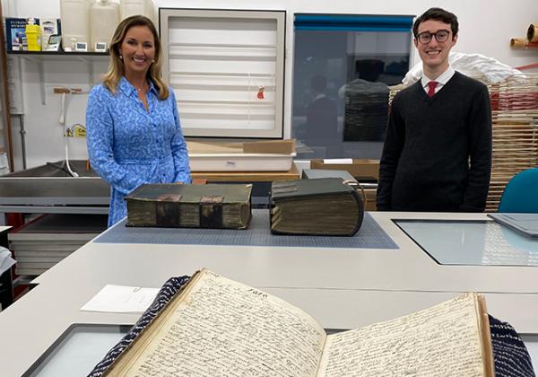 Claire McCollum and Eamonn O'Keeffe with Matthew Tomlinson's diary