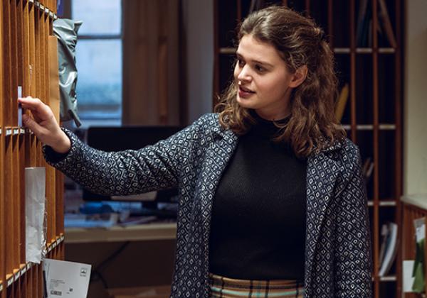 A student checking her pidge, November 2019 - Photo © John Cairns - www.johncairns.co.uk