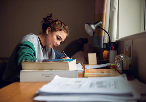 A student preparing for a tutorial in her room - Photo © John Cairns - www.johncairns.co.uk 