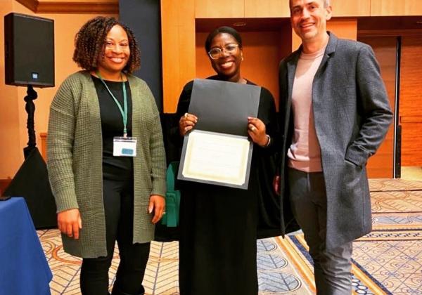 DPhil Jade Bentil at the NACBS with her award