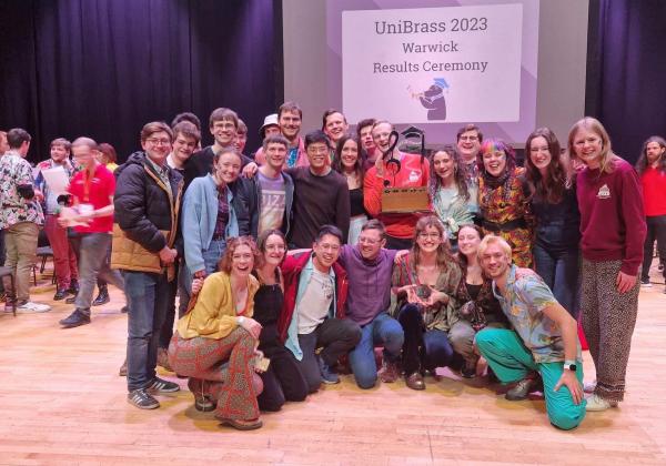 Oxford University Brass Band with the Shield award at the 2023 University Brass Band Championships of Great Britain and Northern Ireland 