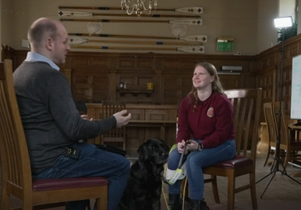 Screenshot from the BBC programme with Ella Caulfield being interviewed by the BBC