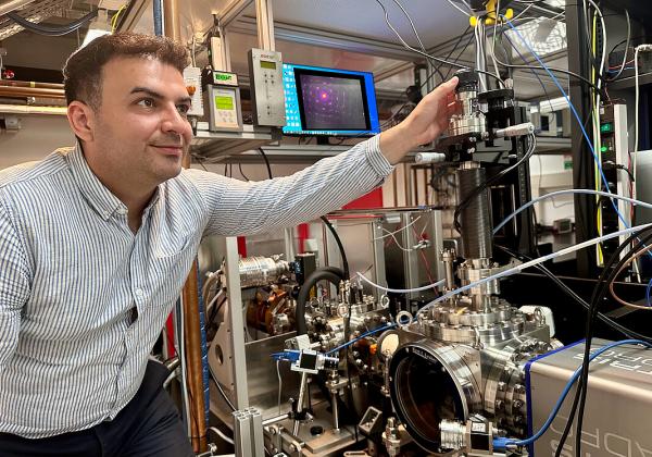 A man in a physics laboratory 
