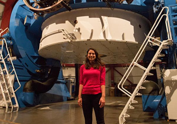 Dr Charlotte Mason with the James Webb Space Telescope - Photo: © Takahiro Morishita Dr Charlotte Mason with the James Webb Space Telescope - Photo: © Takahiro Morishita