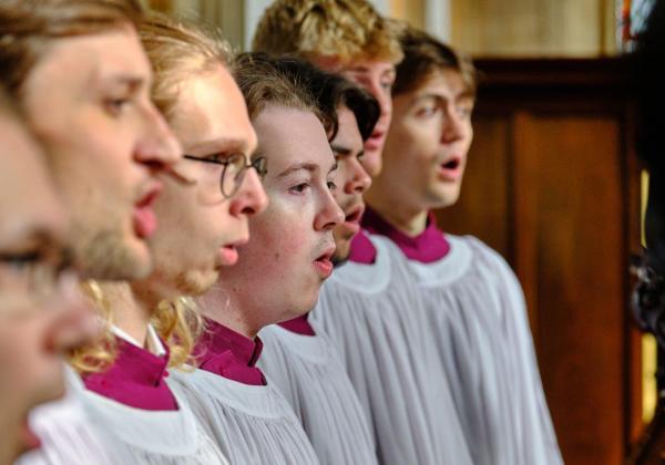 A row of tenors and basses singing in Chapel