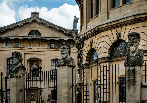 The Sheldonian Theatre exterior, sandstone on cloudy blue sky