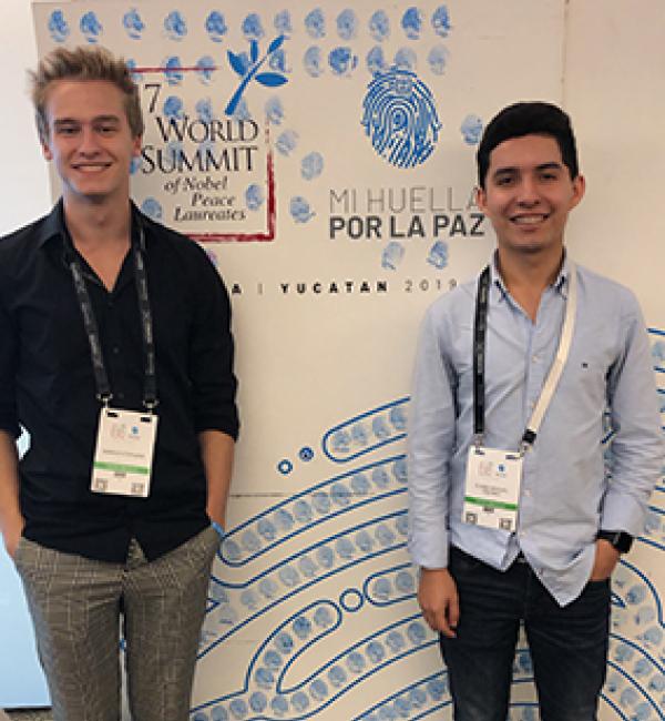 Mario Stepanik (left) and fellow delegate Elian Miguel Osorio at the 17th World Summit of Nobel Peace Laureates - Photo: © Mario Stepanik