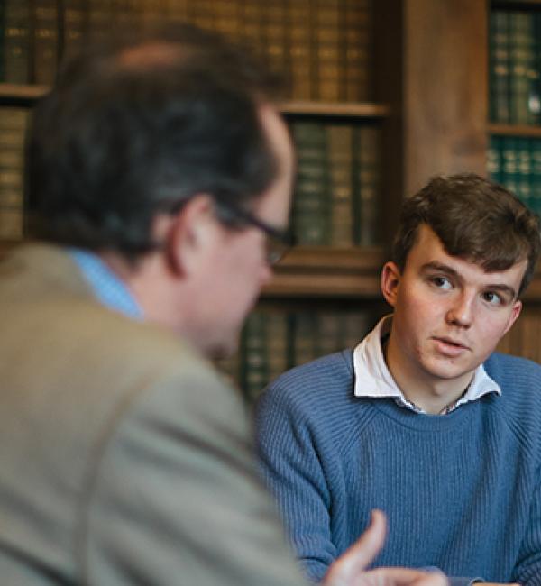 A Fellow and a student in a tutorial - Photo © Ian Wallman