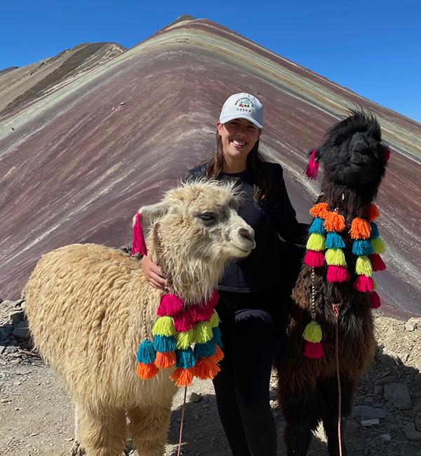 Mariana Gee Olmedilla with llamas