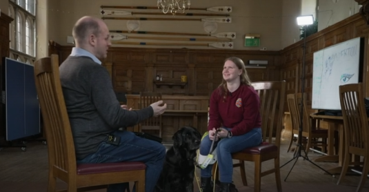 Screenshot from the BBC programme with Ella Caulfield being interviewed by the BBC