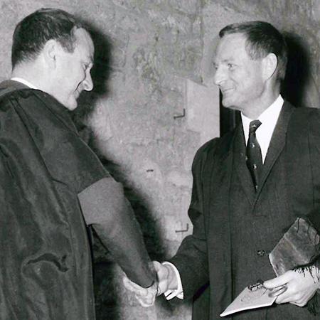 Rex Richards (right) in 1969, being welcomed to the college by John Roberts (then a Fellow in History)