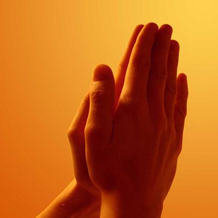 Hands together in prayer