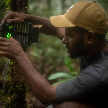 Team member setting up one of the eighty camera traps (c) Expedition Cyclops