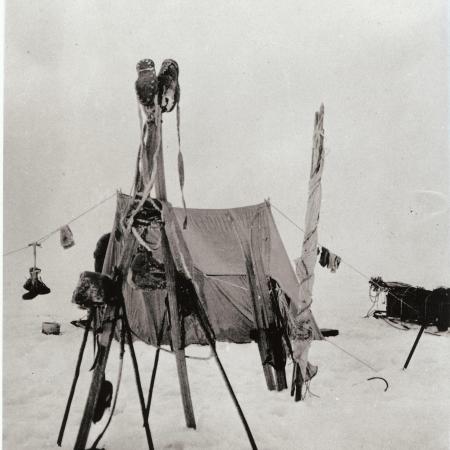 Boots hanging up outside tent